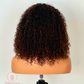 N20 - Peluca 100% Pelo Natural Castaño Oscuro con mechas cobre suave rizada de Ceja a Ceja